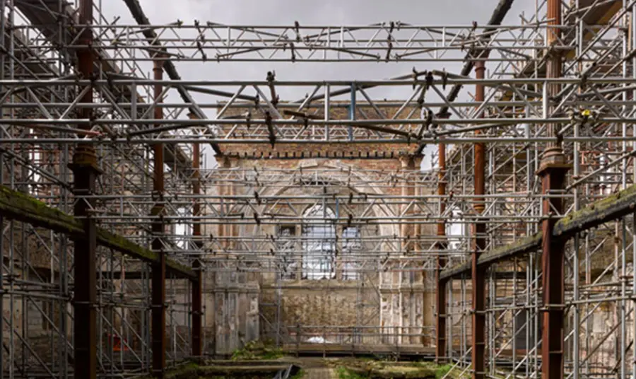 The walls of Sheerness Dockyard being held up by scaffolding