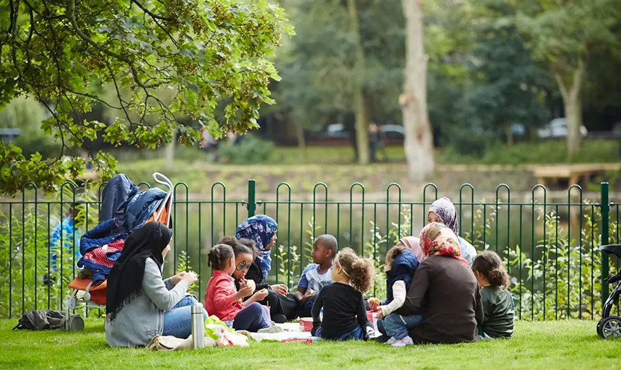 Family having a picnic in a park
