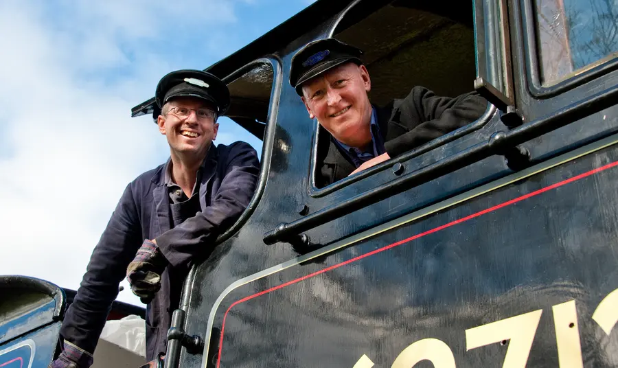 The first six months: our Strategic Funding Framework Men in a train