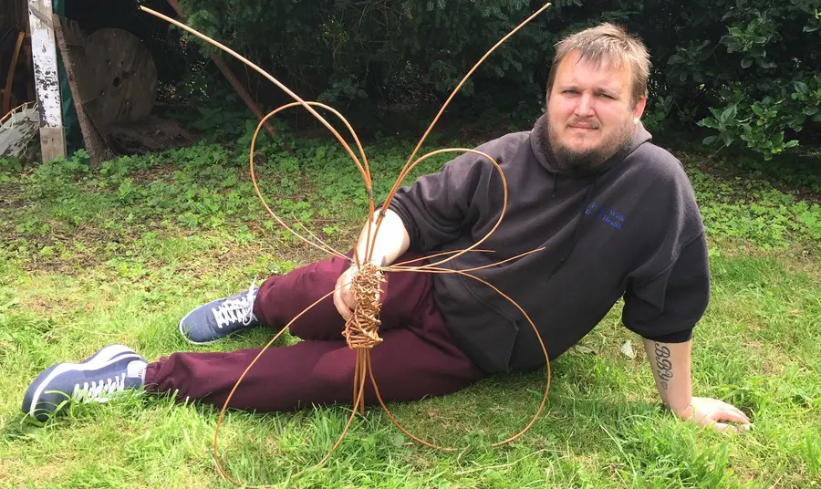 Heritage, mental health and lockdown Man lying with artwork