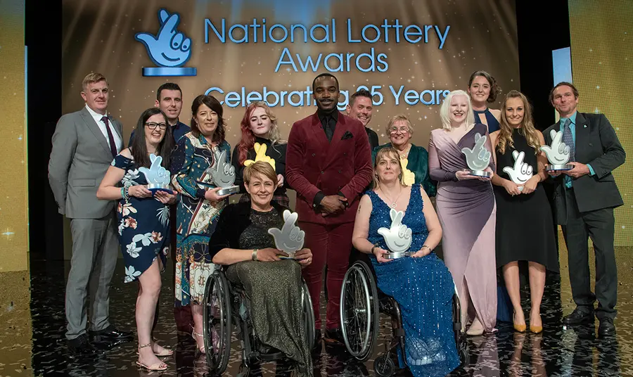 Nominate your heritage ‘lockdown legends’ for a National Lottery award People gathered with awards