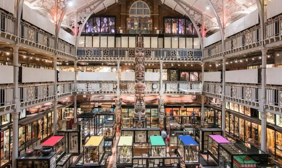 The Pitt Rivers Museum, Oxford The inside of the PItt Rivers Museum, a large open indoor space with exhibition cases