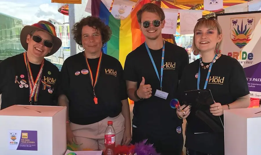 The Hold volunteers at their stand at Suffolk Pride