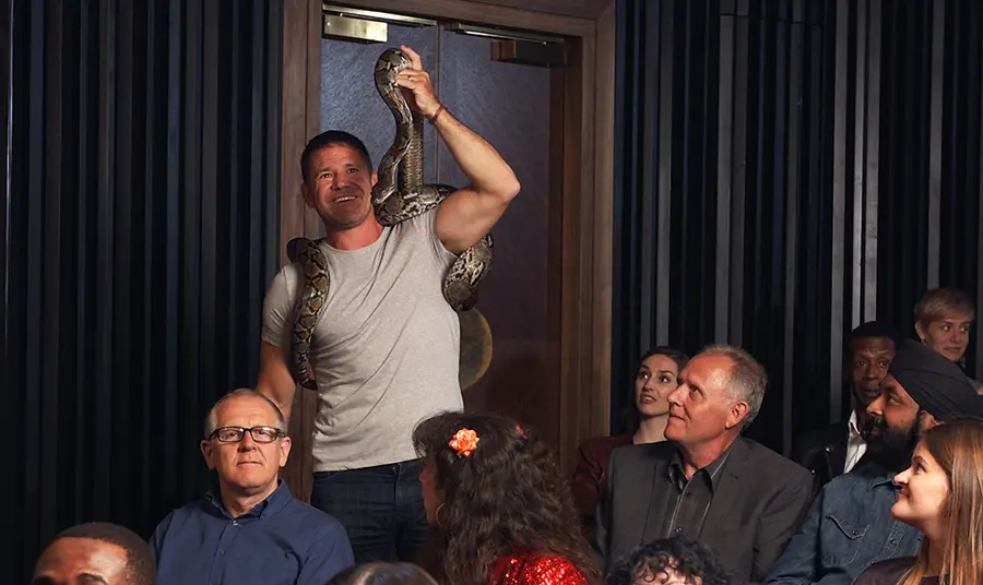 Steve Backshall holding a snake