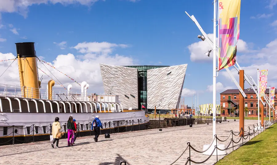 Ss Nomadic ship and Titanic Belfast building in background.