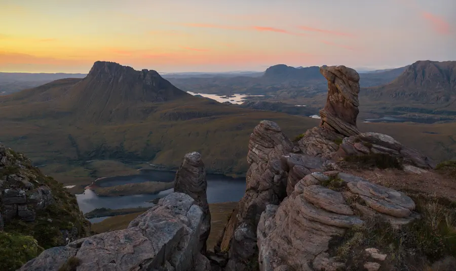 Coigach and Assynt Living Landscape Partnership Rugged landscape at sunset including mountains and jagged rocks in the Scottish uplands
