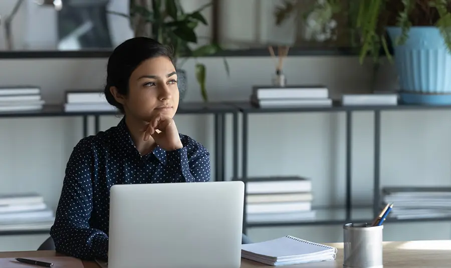 title Young woman with computer