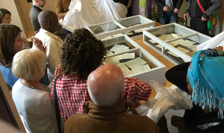 Great War to Race Riots - Black Servicemen's Struggle to Survive at Home and Abroad Participants looking at objects as part of the Great War to Race Riots