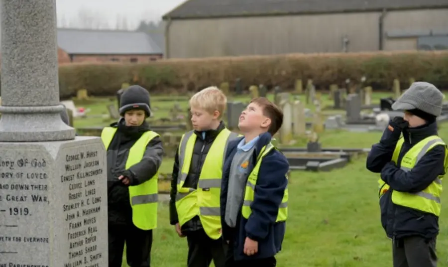 Children deep in their research at Emneth War Memorial Children deep in their research at Emneth War Memorial