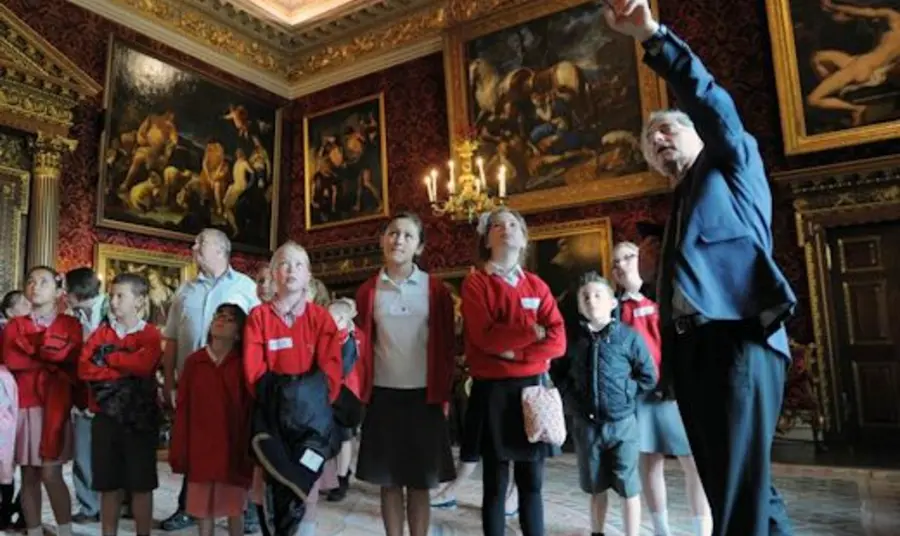 A school party being shown around Houghton Hall, Norfolk A school party being shown around Houghton Hall, Norfolk