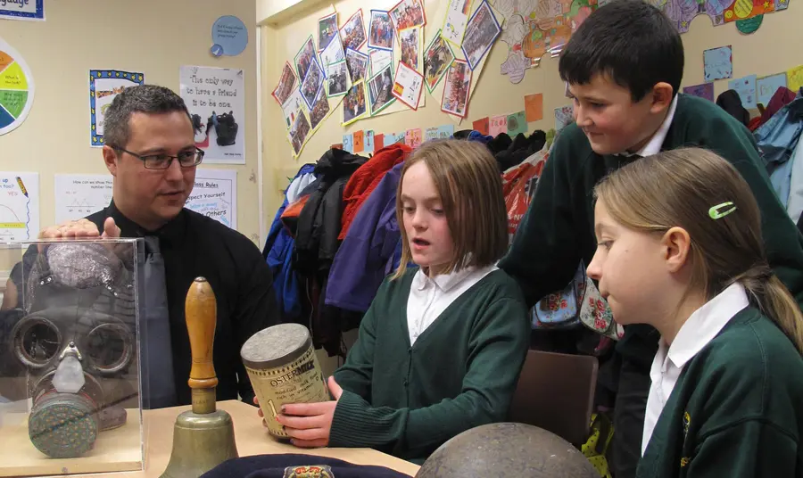 Children viewing First World War objects at a Green Howards Museum outreach event Children viewing First World War objects at a Green Howards Museum outreach event