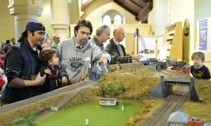 Tracks in Time: Awakening and celebrating the railway heritage of Netherfield People look at a model railway