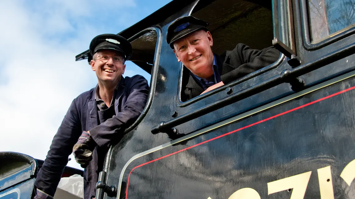 The first six months: our Strategic Funding Framework Men in a train