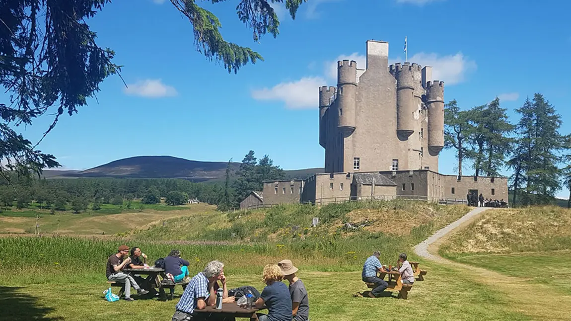 £1.9m to help Highlands heritage Visitors having picnics outside of Braemar Castle