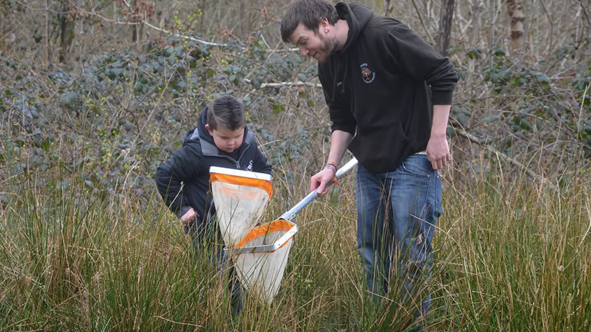 Grants available for community environmental projects in Wales Boy and man with nets