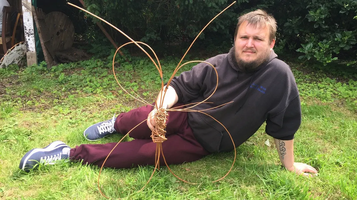 Heritage, mental health and lockdown Man lying with artwork