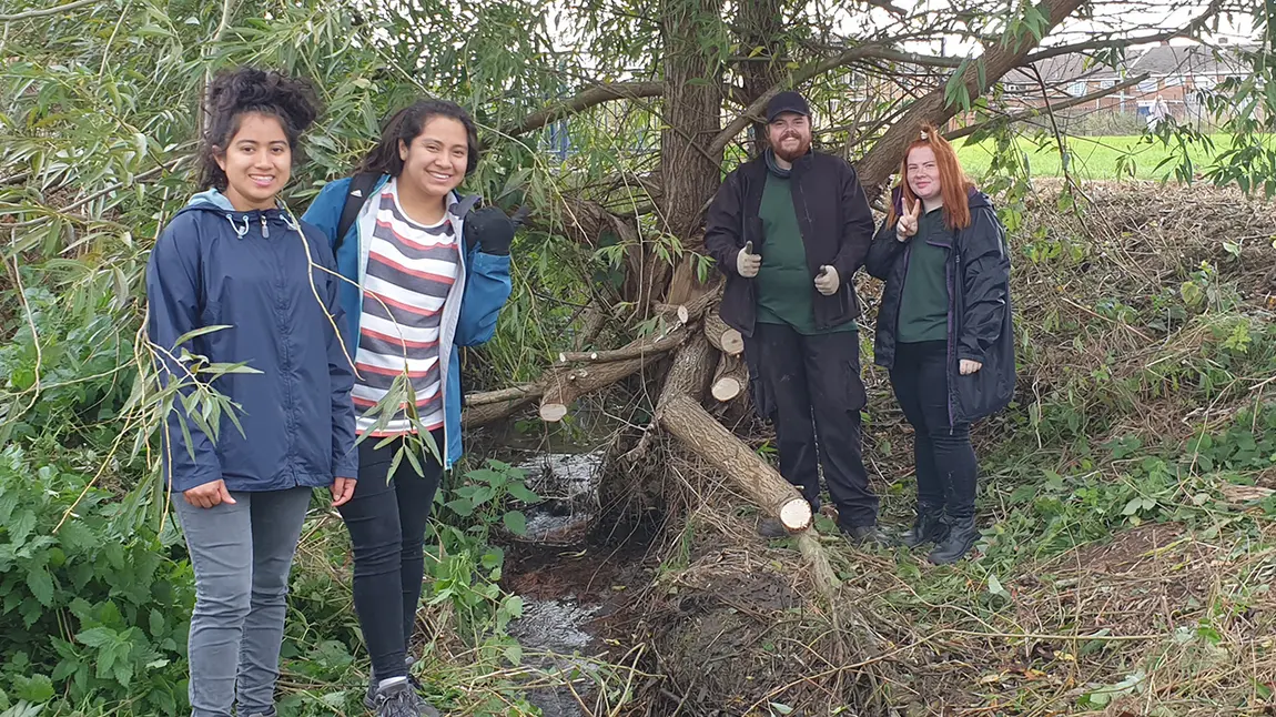 Bringing people together in green spaces Young people in a wood