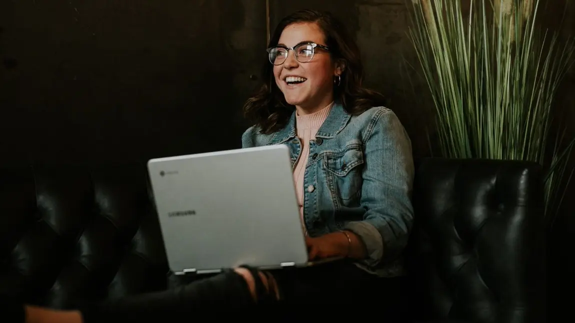 New funding for heritage job creation and skills development in Northern Ireland Person using laptop whilst smiling