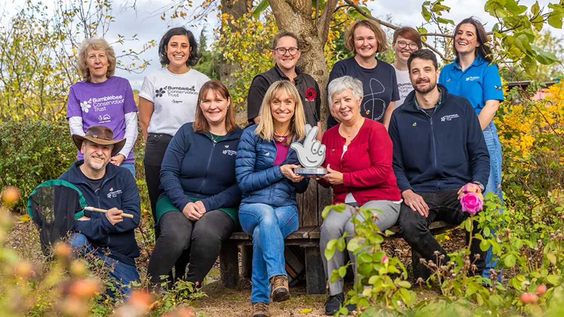 Bumblebee champions win National Lottery Project of the Year Award Smiling group of volunteers