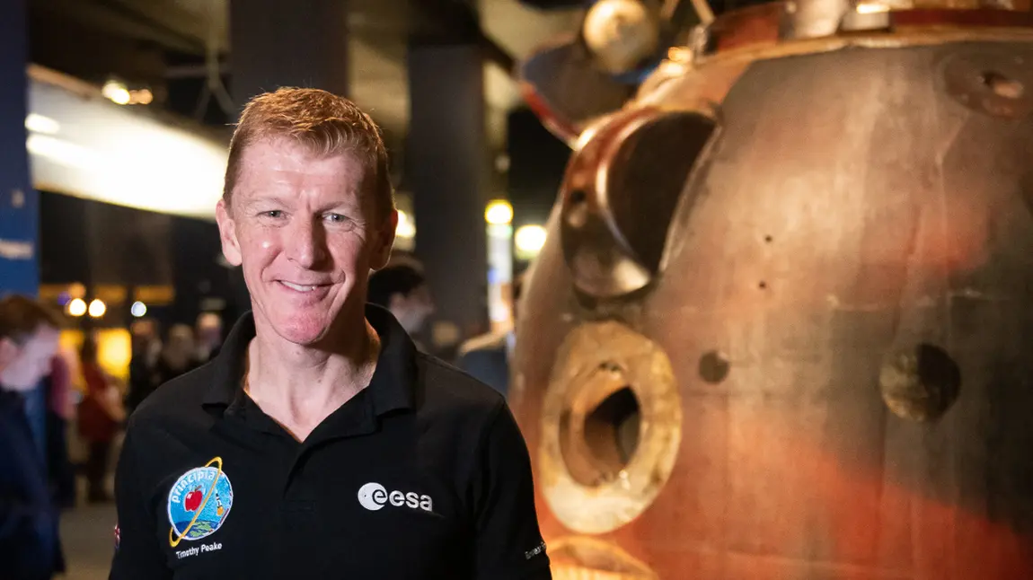 25 years: Astronaut Tim Peake celebrates National Lottery funding for world of science Time Peake next to the rocket that took him to space