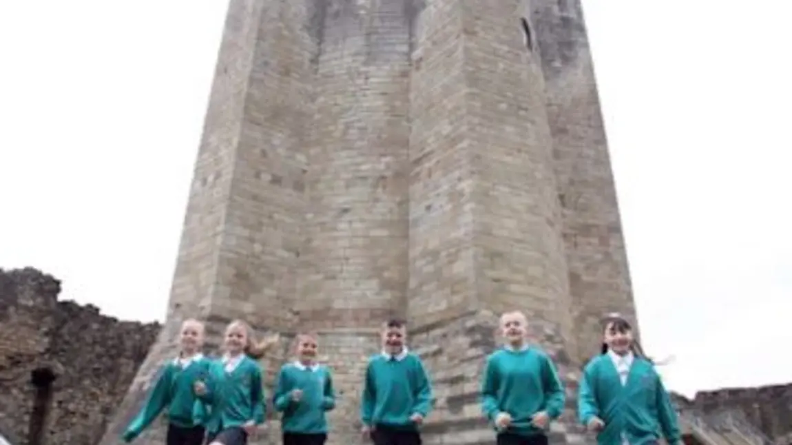 Pupils from Morley Place Junior School help celebrate the reopening of the revamped Conisbrough Castle. Photo Kippa Matthews Pupils from Morley Place Junior School help celebrate the reopening of the revamped Conisbrough Castle. Photo Kippa Matthews
