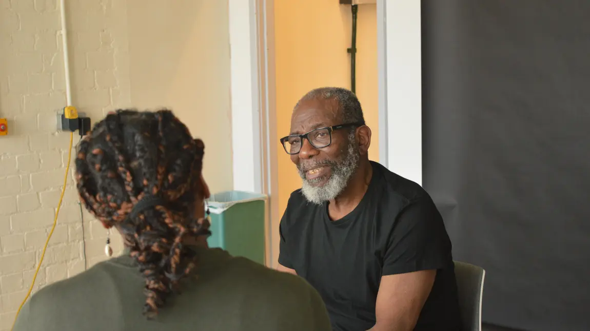 Norma interviews Johnson to record his experiences Norma interviews Johnson to record his experiences