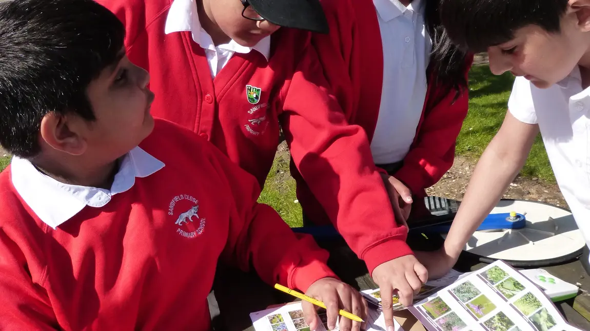 Schoolchildren undertaking a survey Schoolchildren undertaking a survey