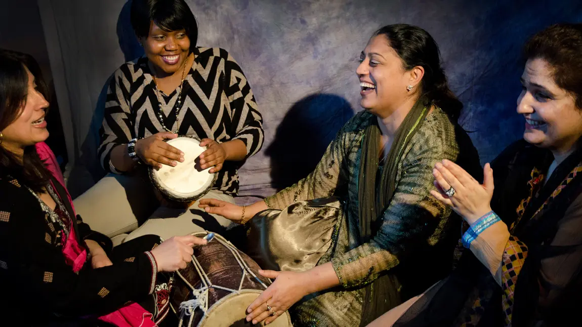 Sharing skills and traditions brought project participants together Women drumming